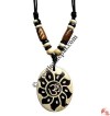 Carved bone pendant63