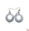 Round white ear ring