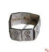Double spiral carved bracelet