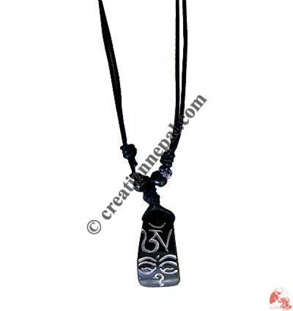 Tibetan Om bone pendant