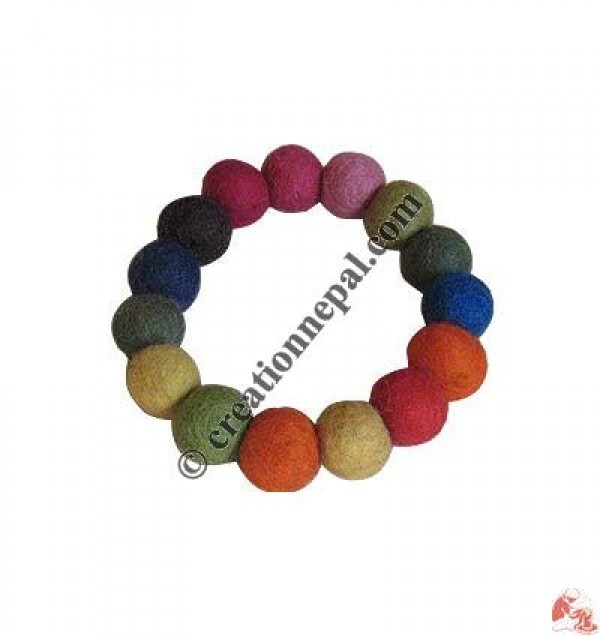 Small plain felt balls wrist band 2