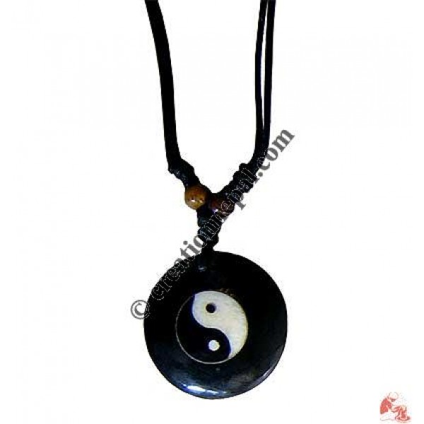 Ying-Yang round bone pendant