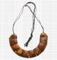 Astamangalas brown necklace