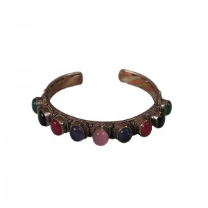 9-stone mixed metal bangle