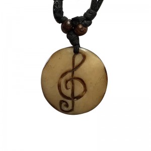 Music note carved bone pendent