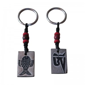 Fish-Om carved stone key ring