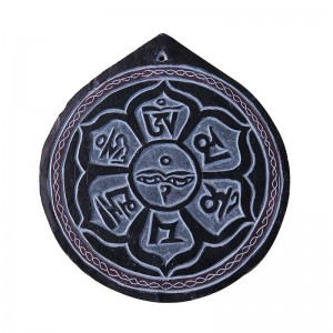 Om Mani carved stone mandala