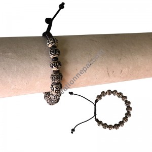 Mantra carved conch wristband