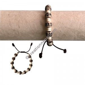 Carved and plain beads wristband