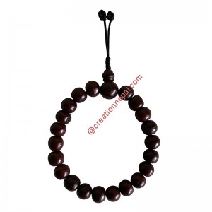 Phoenix eyed Bodhi Dark Brown beads wrist-mala