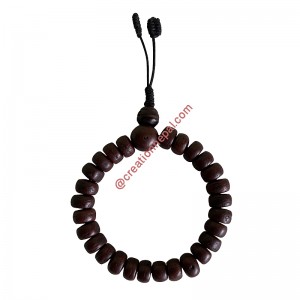 Phoenix eyed Bodhi dark Tyre Beads wrist-mala