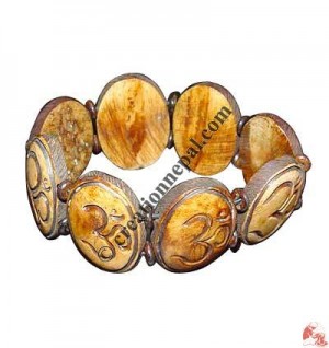OM mantra carved brace