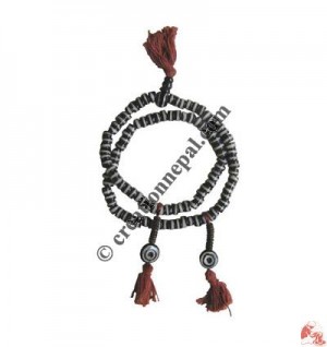 Flat black and white bone prayer beads1