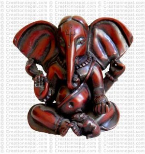 Meditating red Ganesh