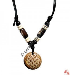 Carved bone pendant72