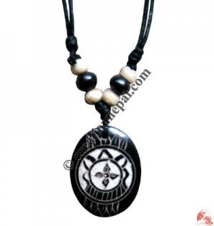 Carved bone pendant124