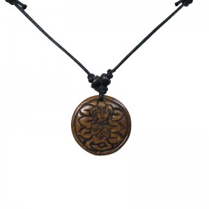 Tara carved bone pendent