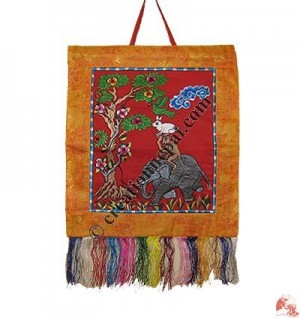Embroidered four-friends brocade wall hanging