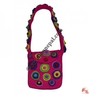Circles and balls decorated small felt bag