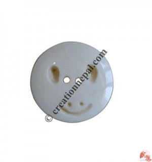 Smily carved bone button (packet of 10)