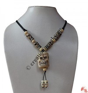 Skull Carved Bone Pendant