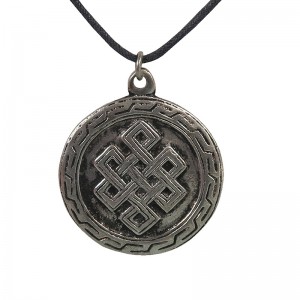 White metal endless knot pendent
