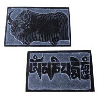 Yak and Om Mani carved stone panel