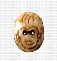 Face carved bone button (packet of 10)