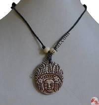 Tribe design bone pendant